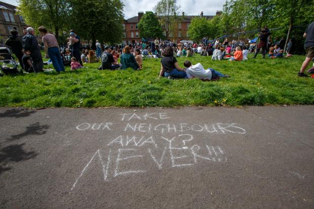 Glasgow Times: People in Maxwell Square Park where people were performing on the Love Music Hate Racism Stage