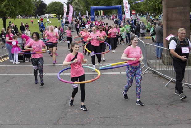 Glasgow Times: The Strathaven Superhoopers, power hooped their way through the entire 5k course. Image by Robert Perry.