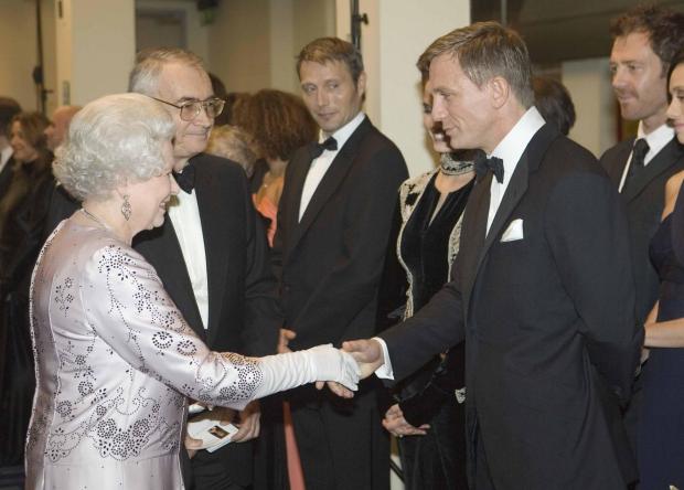 Glasgow Times: The Queen and Daniel Craig. PA
