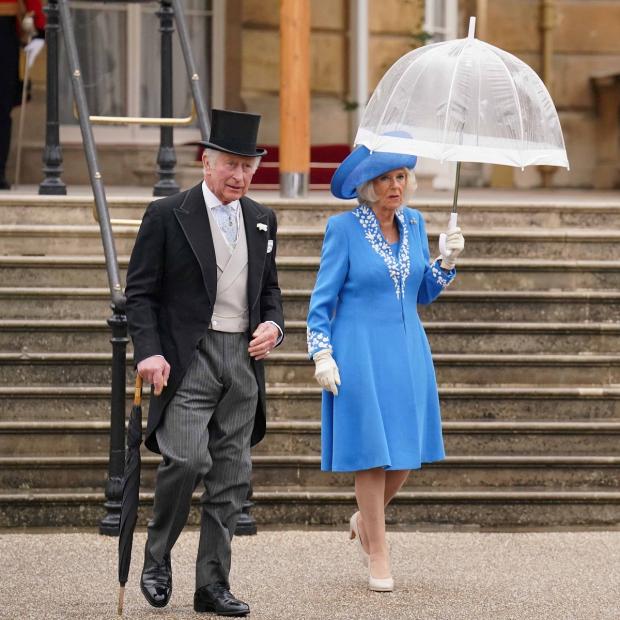 Glasgow Times: The Prince of Wales and the Duchess of Cornwall during a Royal Garden Party at Buckingham Palace. Picture: PA