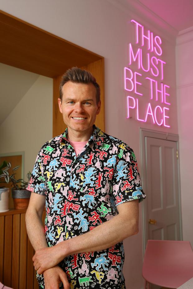 Glasgow Times: John McGonagle pictured at home in Glasgow. John has written a book- Retired Teenagers, The Story of a Glasgow Club Night-  about the successful club night he ran in Glasgow for many years...Photograph by Colin Mearns.12 May 2022.For the Glasgow Times,