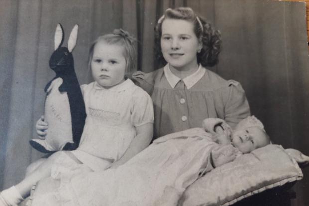 Glasgow Times: Ella, with daughter Helen (left) and son John (right). Both Helen and John passed away in their 60s, leaving Ella heartbroken.