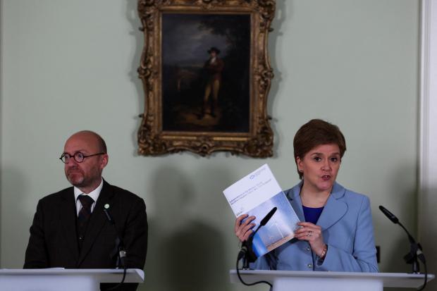 Glasgow Times: Scottish Government Minister and Scottish Green Party Co-Leader Patrick Harvie (left) and First Minister Nicola Sturgeon speaking at a press conference in Bute House in Edinburgh. Credit: PA