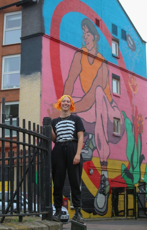 Glasgow Times: Artist Molly Hankinson with mural by Gordon Terris