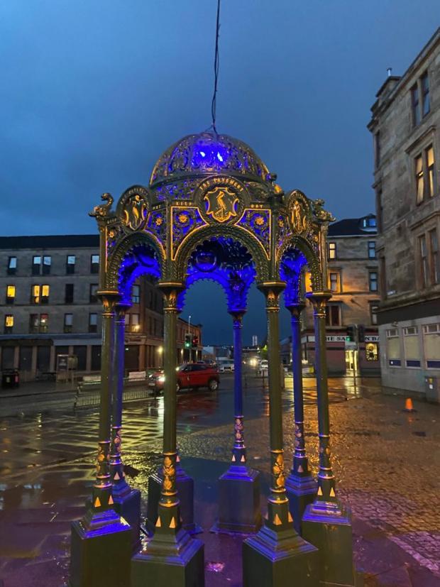 Glasgow Times: The Saracen Monument lit up blue
