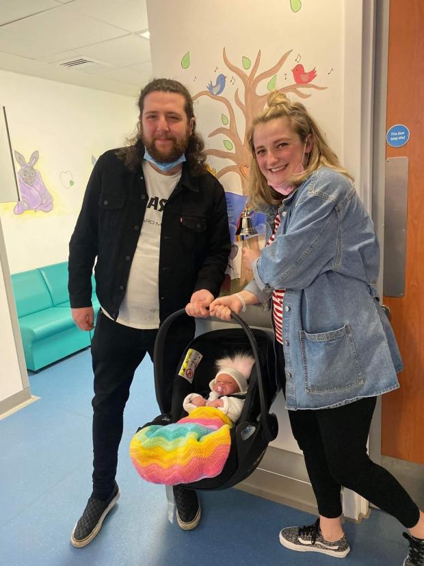 Glasgow Times: Dariush and Amy with baby Yasmin