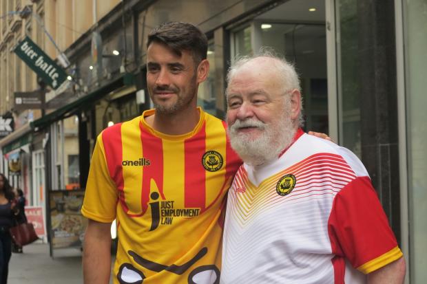 Brian Graham, wearing the club's Kingsley kit, meets a fan at Thistle's kit launch