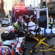 Woman in hospital after man ‘tries to stab several people’ in Sydney