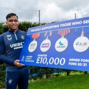 Rangers striker Alfredo Morelos was on hand to mark the total