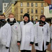 Eco-activists return to key Glasgow bridge after chained neck protest