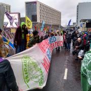 Climate activists rally at the COP26 Blue Zone in Glasgow