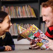 Olympic Gold Medallist, Greg Rutherford reads from the ‘World’s loudest ever comic strip’, which is part of a World Book Day edition of the Beano, to pupils of Laycock Primary school as part of the comic’s ‘Libraries Aloud’ reading
