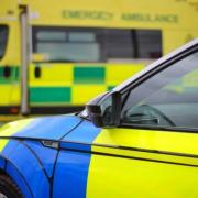 Man rushed to hospital after crash between FOUR vehicles