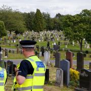Lambhill Cemetery with generic Police Scotland image