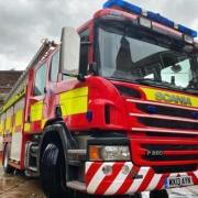 Firefighters on scene of burning garage in Glasgow