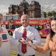 From left to right: Bridgeen Mullen (Clydeside Distillery), Richy Graham (City Sightseeing Glasgow) and Anh Nguyen (Experience Glasgow) with the new sales terminals for resellers.  
Photos by Jamie Simpson/West Coast Motors