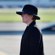 The First Minister Nicola Sturgeon as the coffin of Queen Elizabeth is met at Edinburgh Airport by a guard of honour from the Royal Regiment of Scotland on its journey from Edinburgh to Buckingham Palace, London, where it will lie at rest. [PA]
