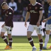 Hearts midfielder Cammy Devlin, left, after being sent off against Rangers at Tynecastle on Saturday