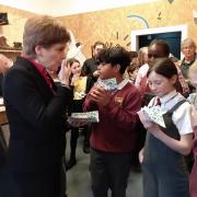 Nicola Sturgeon helps launch children's sustainable fashion shop in the Southside