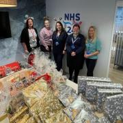 NHS 24 staff provide gifts for care home and animal shelter