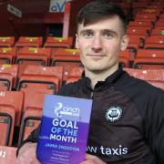 Thistle goalkeeper Jamie Sneddon with his goal of the month award