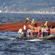 Rescue operation to resume after tugboat sinks near Greenock