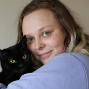 Woman's agony after fire saw beloved cat trapped in condemned building for 12 days