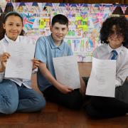 Devon, Joseph and Yara with the winning poem