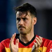 Brian Graham claps the Thistle fans