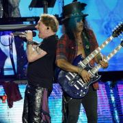 Axl Rose and Slash of Guns N' Roses performing on the Pyramid Stage at the Glastonbury Festival at
