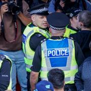 Glasgow woman one of two arrested on Royal Mile amid service for King