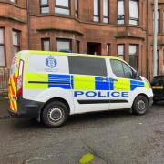 Man found dead in his flat in Glasgow