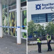 Police tape off area between Hamilton VUE and ASDA after assault