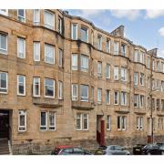 Top-floor flat in 'vibrant' Glasgow area on sale for £105k