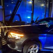 Car crashes into building following pursuit of allegedly speeding vehicle