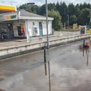 Flooding on Paisley Road at Arkleston roundabout