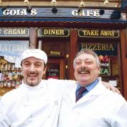 Alfredo  and his father Nicky outside their long established family run Coia's Cafe in 1999