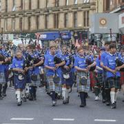 Globally acclaimed pipe band take to the streets of Glasgow