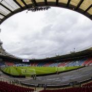 Football fan tried to invade pitch and slapped cop at Hampden Park