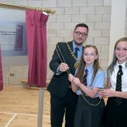 Provost Kenneth Duffy with pupils Emily and Robyn