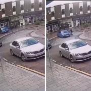 Watch moment car rolls down hill and crashes into Card Factory shop