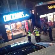 Two people arrested following disturbance in shop