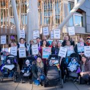 Families affected by the Scottish Government's decision to downgrade Wishaw Neonatal Unit protest outside the Scottish Parliament at Holyrood, Edinburgh. Picture date: Thursday November 9, 2023.