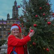 Glasgow's Lord Provost hangs final bauble on George Square Christmas tree