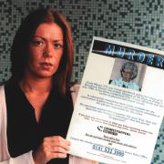 A reward poster for information surrounding Emily Mutch's murder