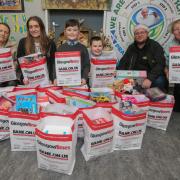 'I am proud of her': Glasgow school pupil on his mum helping donate items