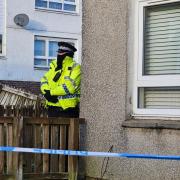 Man reported after dog shot dead following 'attack'