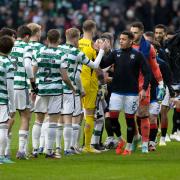 Celtic and Rangers' players shake hands