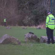Cops probe 'unexplained' death after 'burned' body found on football pitch