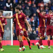The Motherwell players celebrate